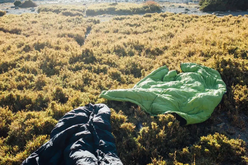 Removing excess water from the down sleeping bag on a drying location