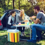 A family famping with Cooler in forest