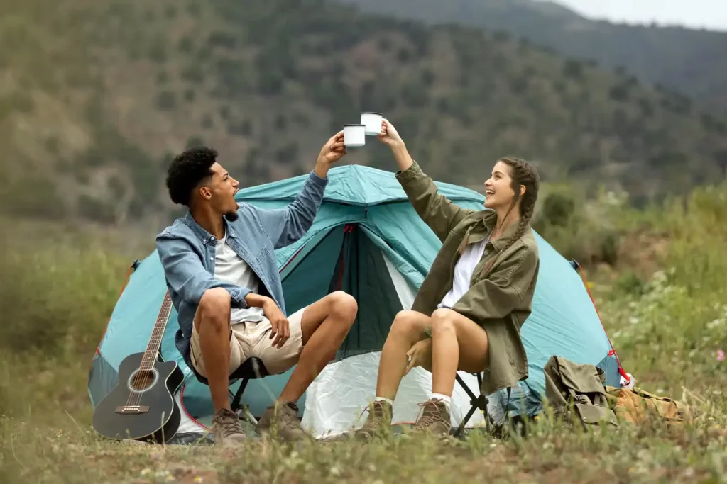 Couple camping with a tent